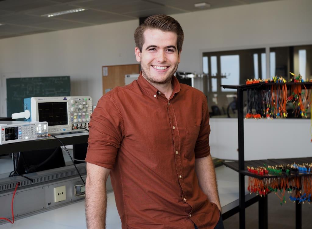 
                                Male student sitting in computer lab
                            