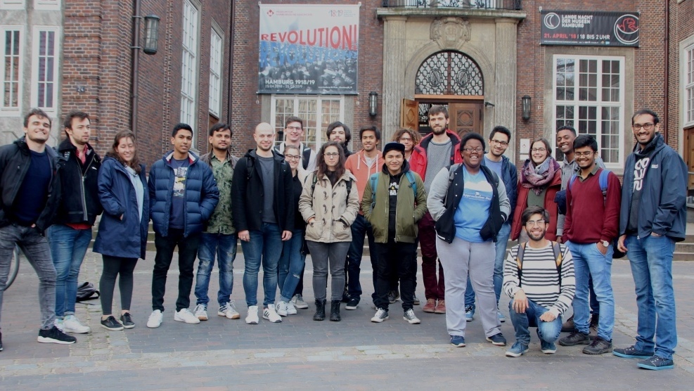 Group of students smiling into the camera