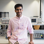 Male student standing in an engineering lab