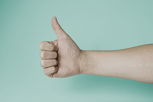 Hand symbol, likes thumb up of right hand with white background Copyright