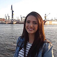 Maria Isabel Pereira Soares da Silva - exchange student Female student standing at the container port