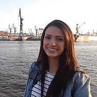 Maria Isabel Pereira Soares da Silva - exchange student Female student standing at the container port