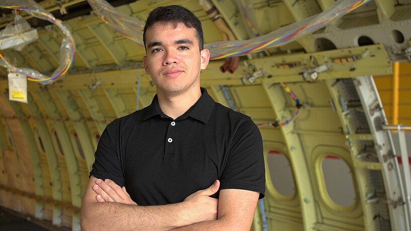 Male student in a A300 fuselage