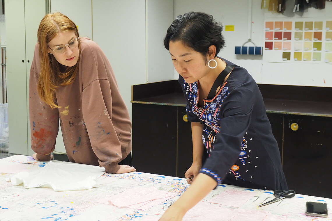 Two people in a textile design lab