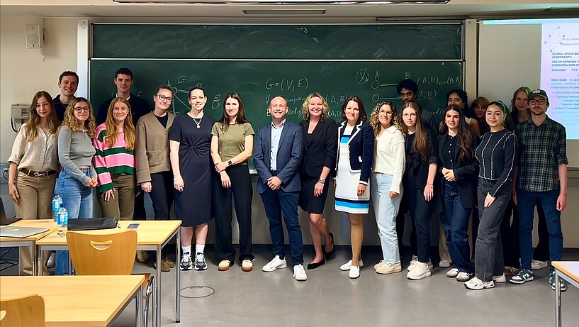 Group of students with professor