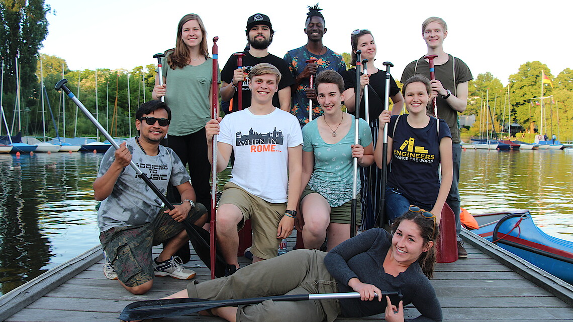 Group of students with canoe oars