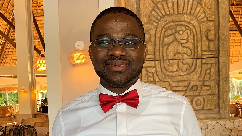 African student smiling into the camera