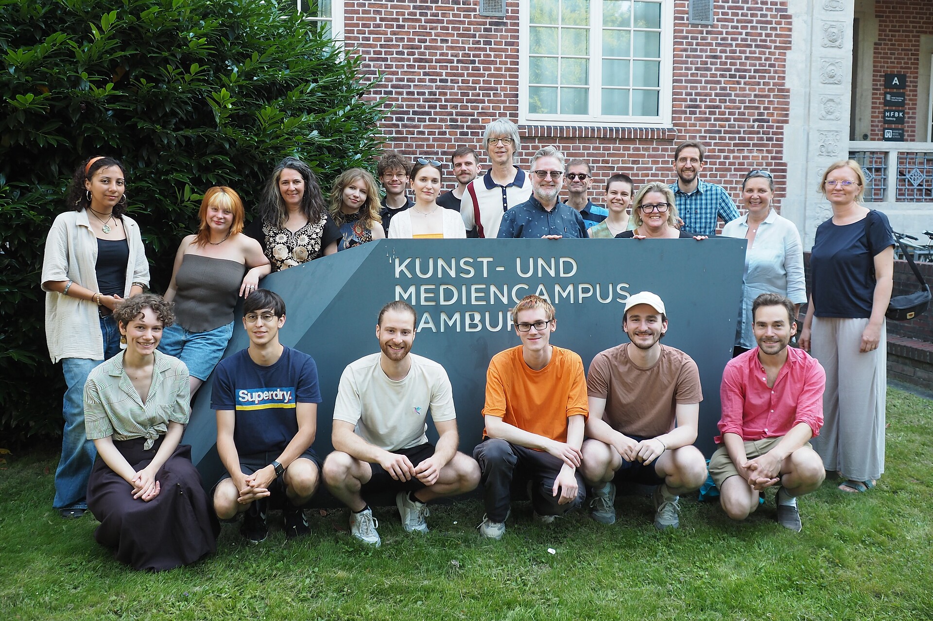 
                                                Group of students and professors
                                            