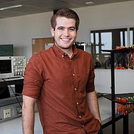 Lachie Townsend - Information Engineering Male student sitting in computer lab