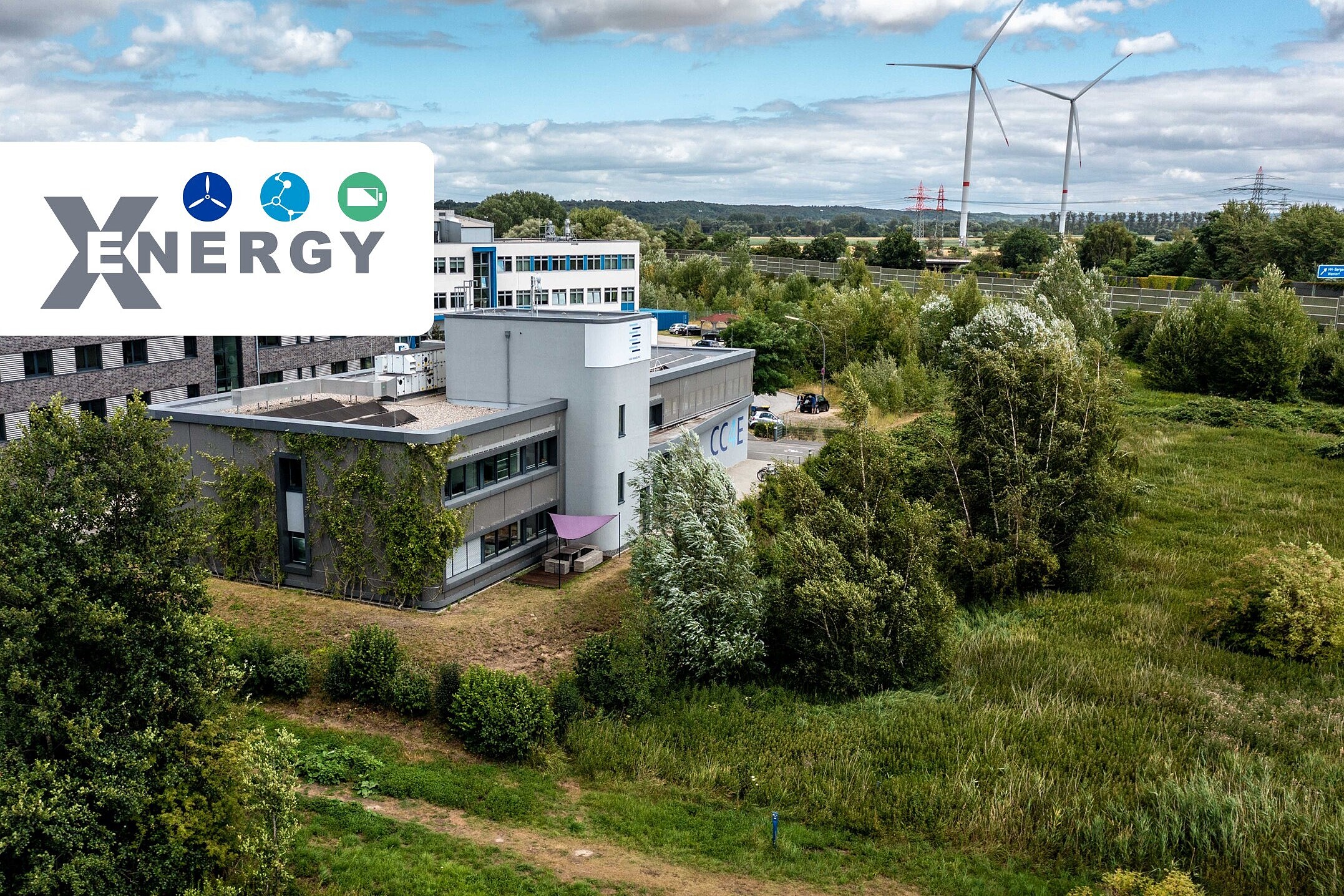 
                CC4E Energie-Campus in Hamburg Bergedorf mit Forschungswindpark im Hintergrund
            