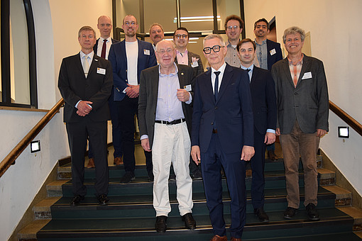 
                speaker and guests at a coffee break
            